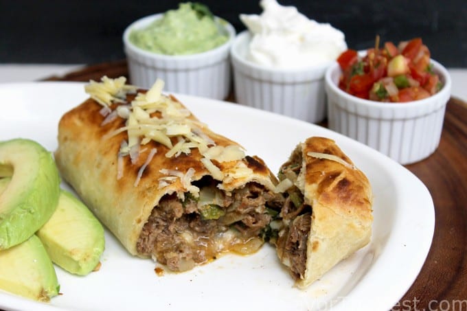 Queso-Smothered Beef Chimichangas - The Chunky Chef