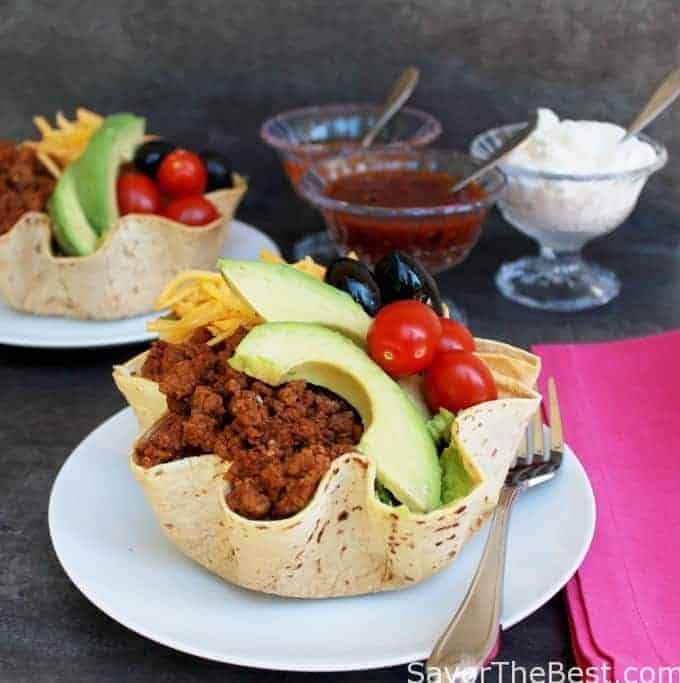 Taco salads in tortilla shell bowls.
