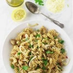 Pasta with Fennel and Mushrooms in a serving dish next to a spoon.