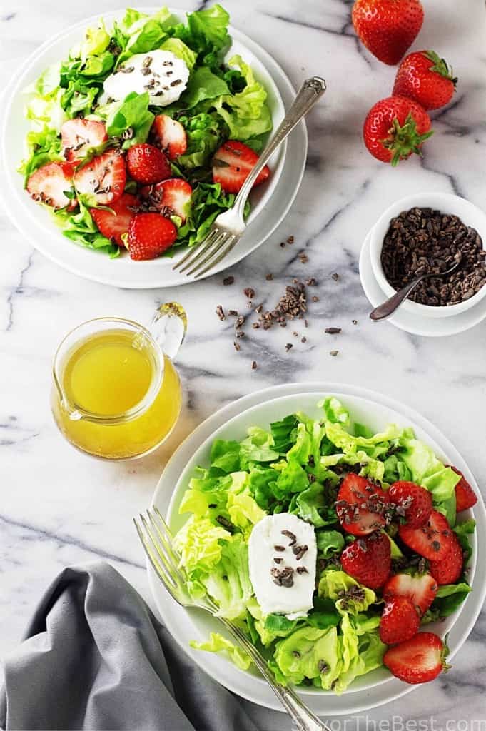 butter lettuce salad with strawberries and cocoa nibs