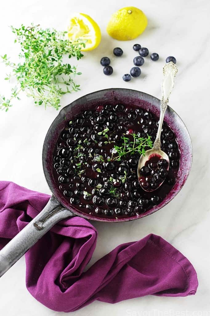 Blueberry sauce in a skillet. 
