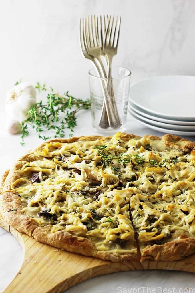 A crunchy whole grain pizza crust topped with creamy cheese sauce