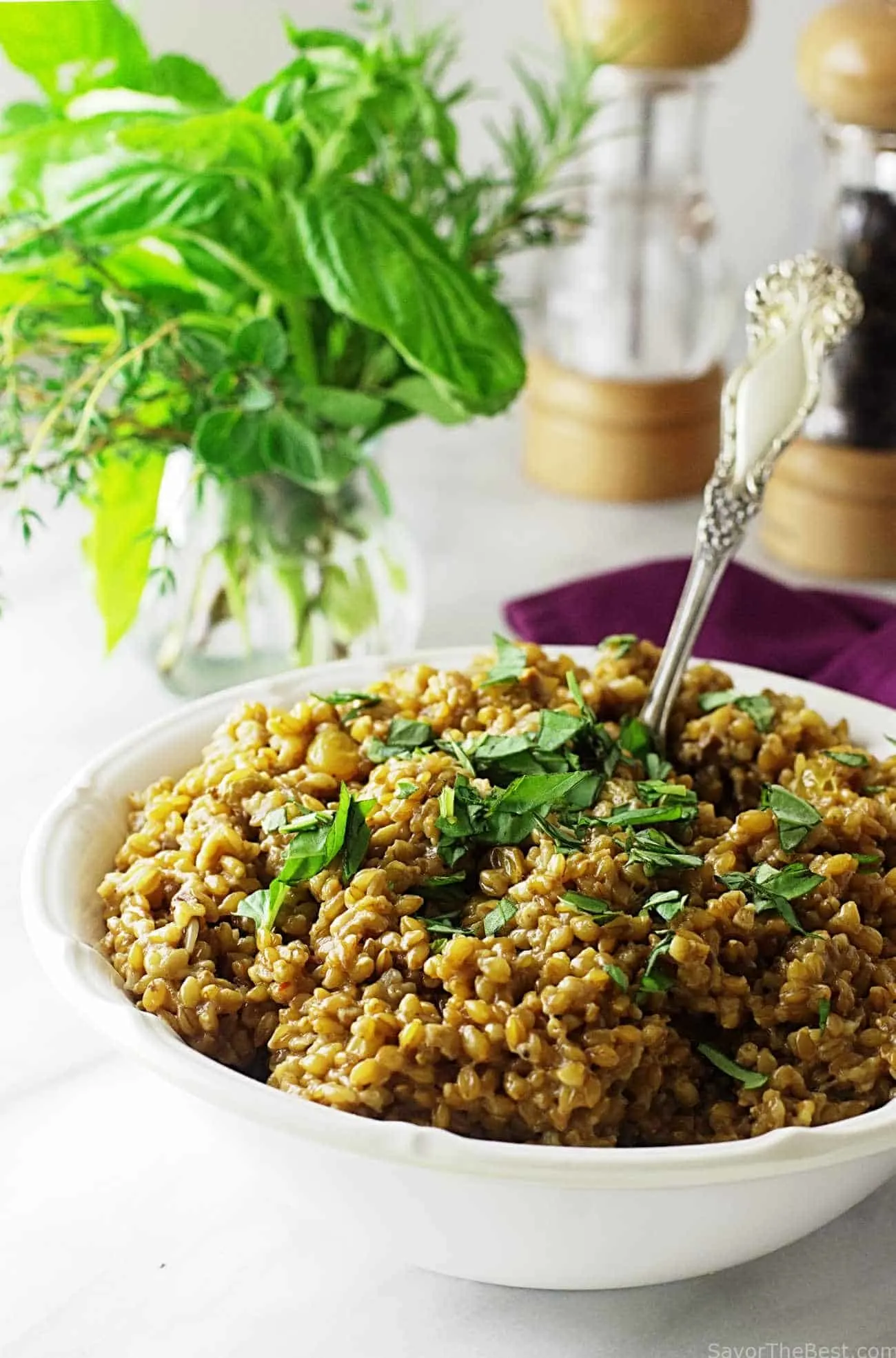 einkorn risotto with fresh herbs on top