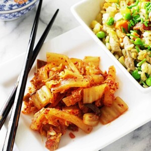 A serving of homemade kimchee on a dinner plate.