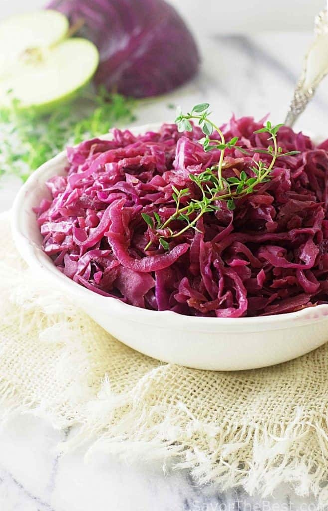 A serving dish filled with braised red cabbage. 