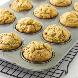 Zucchini muffins with kamut flour in a baking pan.