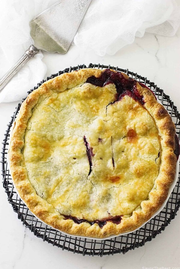 Overhead view of a pie on a wire cooling rack