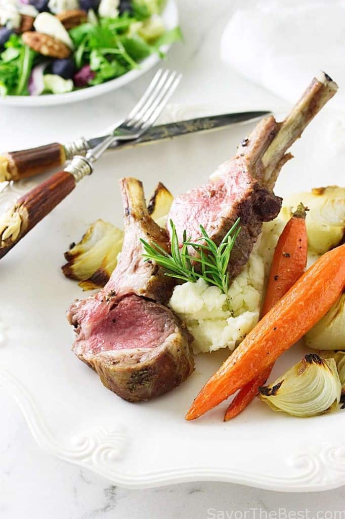 Garlic Rosemary Roasted Rack of Lamb with mashed potatoes, roasted carrots and baby onions.