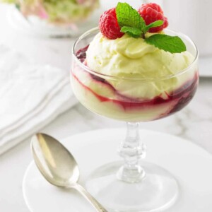 A lemon parfait swirled with raspberry sauce.