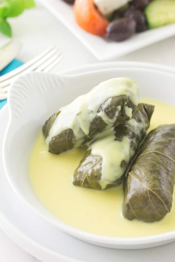 Lamb Stuffed Grape Leaves (Dolmas) with Avgolemono Sauce