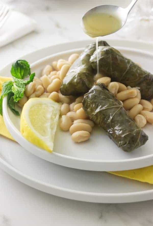 Lamb Stuffed Grape Leaves (Dolmades) with Lemon Sauce Savor the Best
