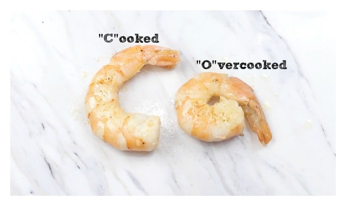 cooked shrimp next to an overcooked shrimp
