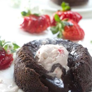 Molten chocolate lava cake with strawberry ice cream