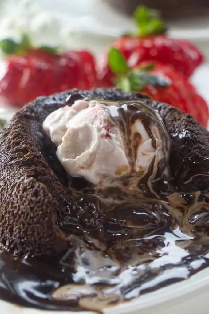 Ice cream melting into the chocolate lava cake