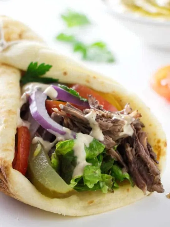 close up of a beef shawarma sandwich wrap