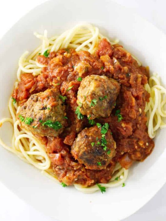 Italian meatballs and spaghetti with tomato-garlic sauce