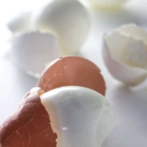 2 hard boiled eggs with the shells peeled