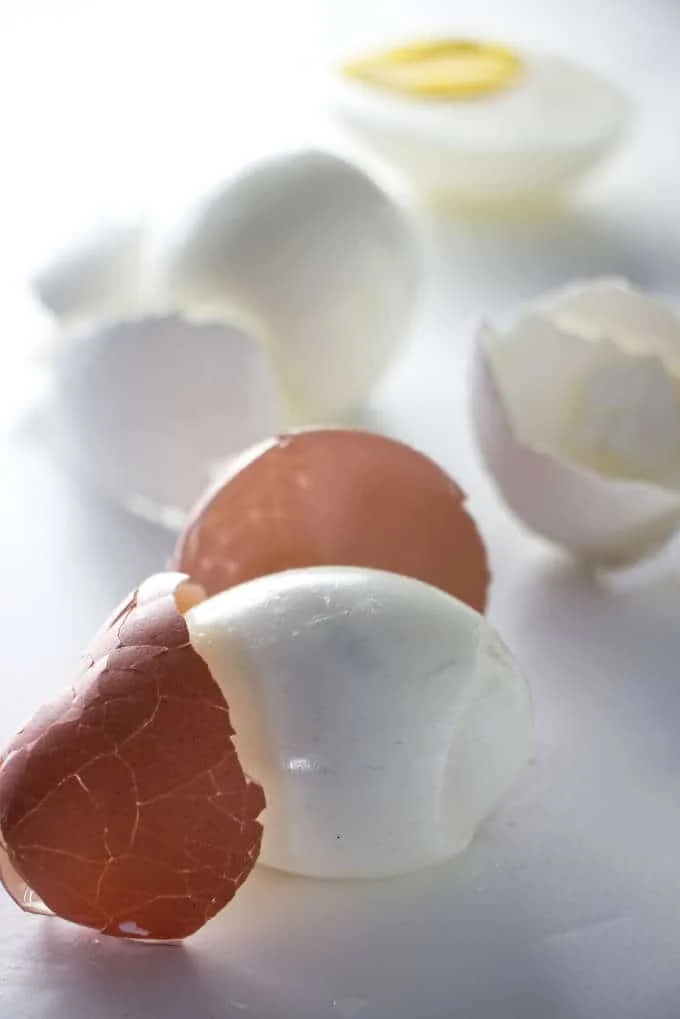 2 hard boiled eggs with the shells peeled