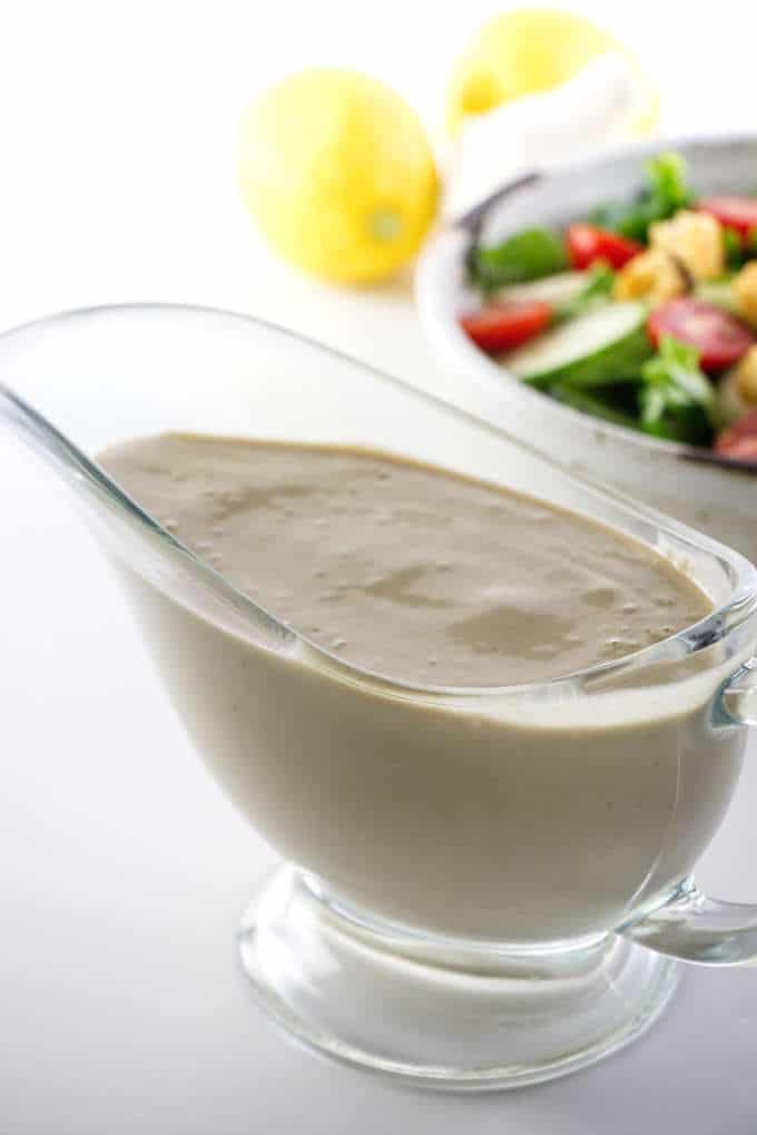 Tangy tahini dressing on a tossed salad