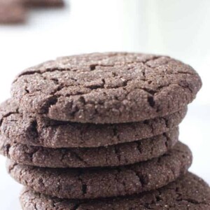 five chocolate cookies stacked on each other