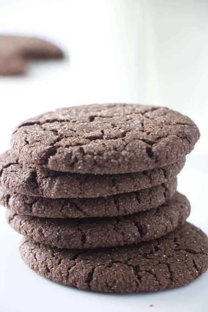 five chocolate cookies stacked on each other