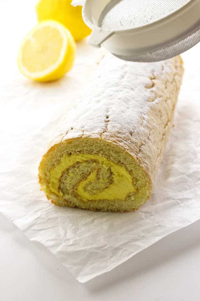 Lemon Cake Roll sprinkled with powdered sugar