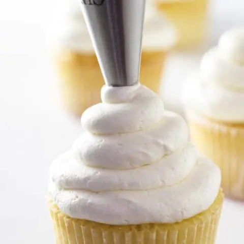 closeup of a cupcake with buttercream frosting