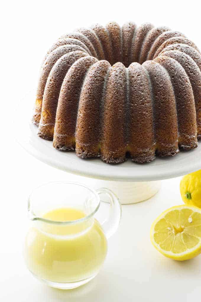 Lemonade bundt cake with creamy lemon dessert sauce.