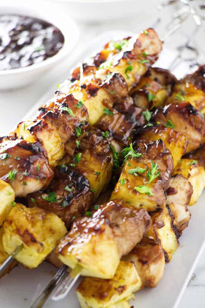 closeup of pineapple chicken kabobs. cookout ideas for labor day.