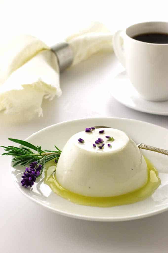 Serving of lavender panna cotta with lemon syrup