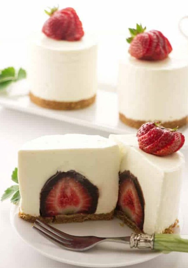 No Bake cheesecake with a chocolate covered strawberry in the center