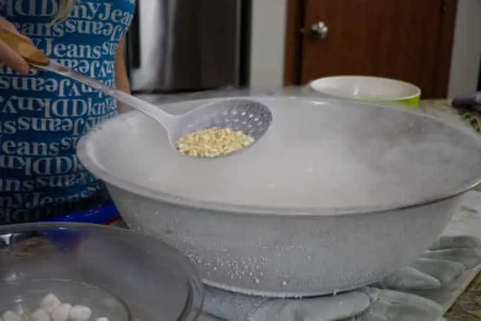 scooping ice cream dots out of liquid nitrogen 