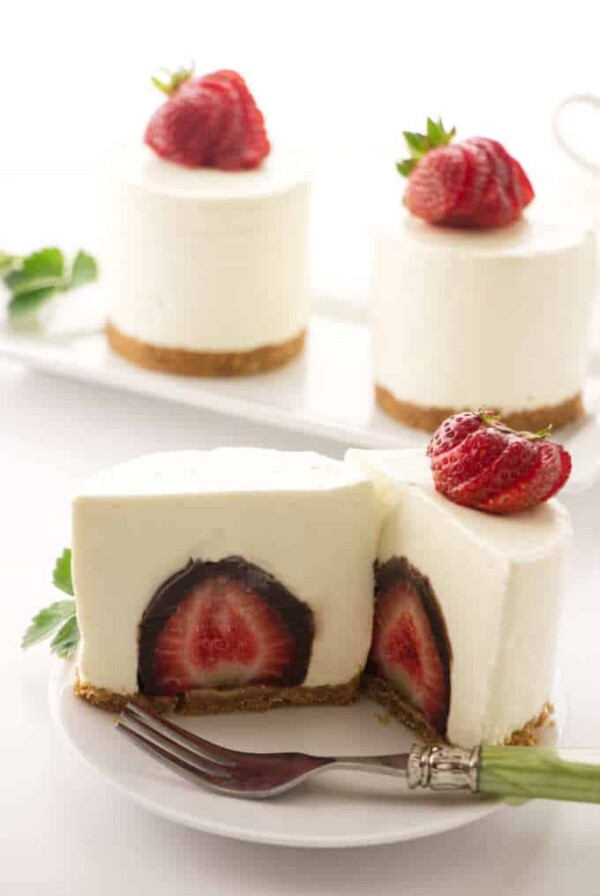 No Bake cheesecake with a chocolate covered strawberry in the center