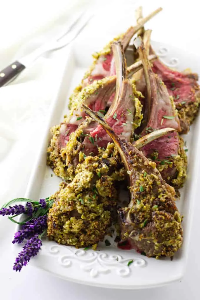 Overhead view of platter of lavender pistachio crusted lamb