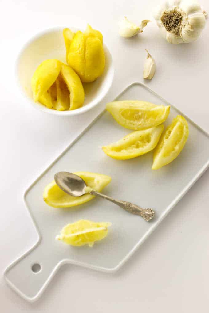 dish of preserved lemons, garlic, preserved lemons