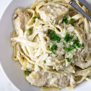 overhead shot of a bowl of garlic butter chicken pasta