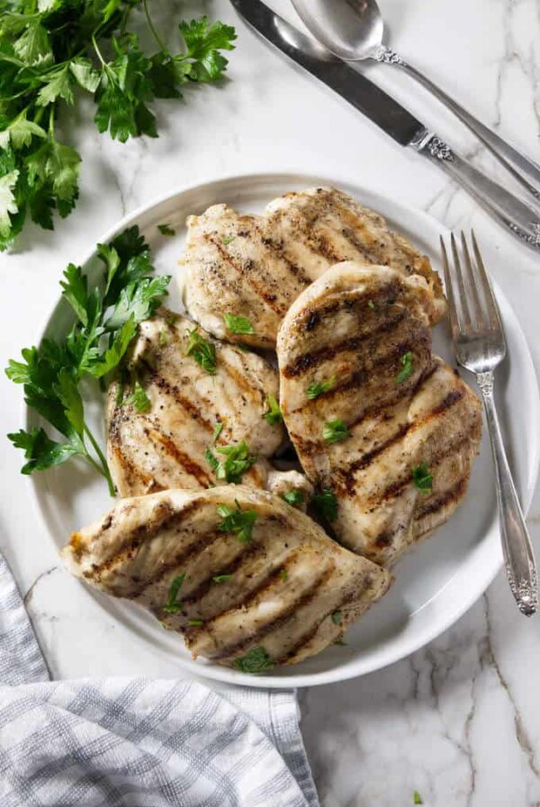 overhead shot of 4 grilled chicken breasts