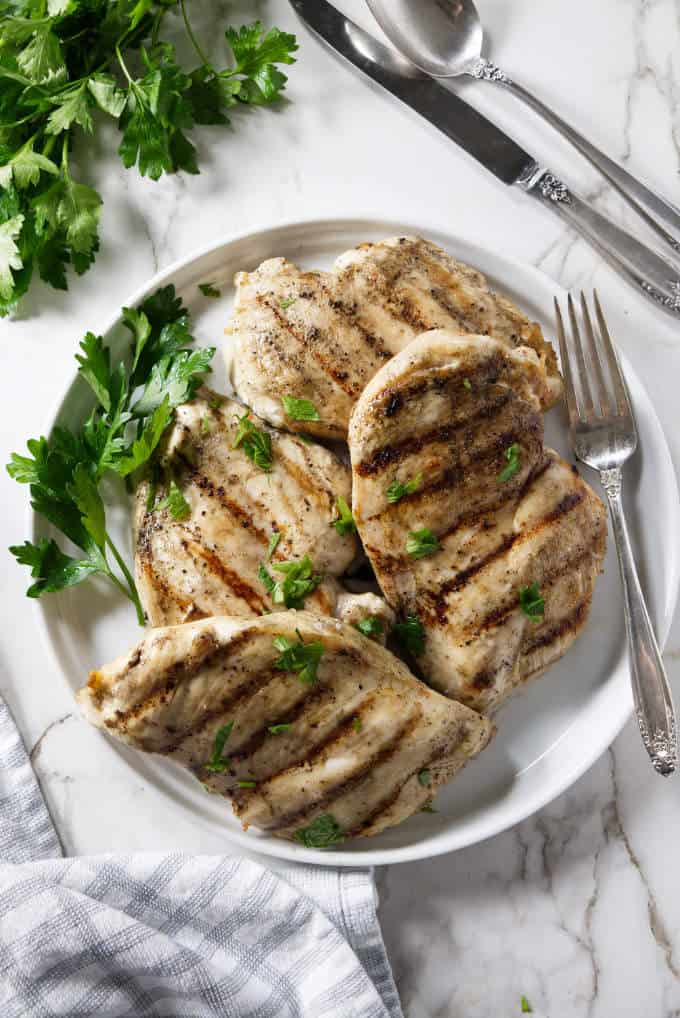 overhead shot of 4 grilled chicken breasts