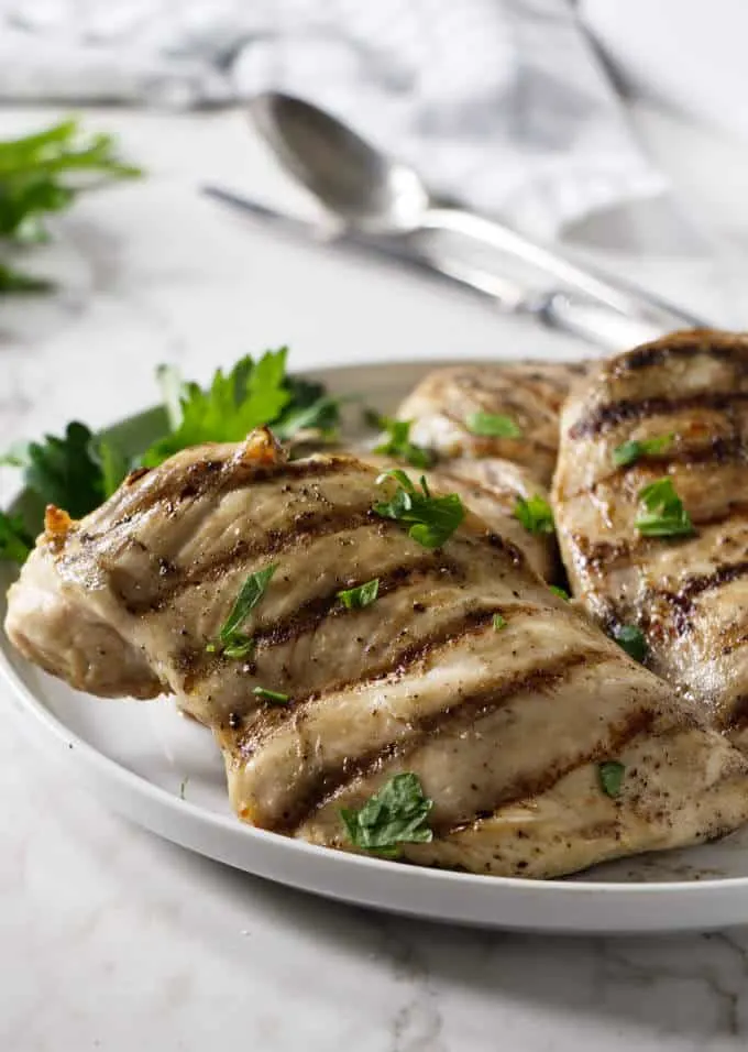Grilled chicken breast on a serving plattter