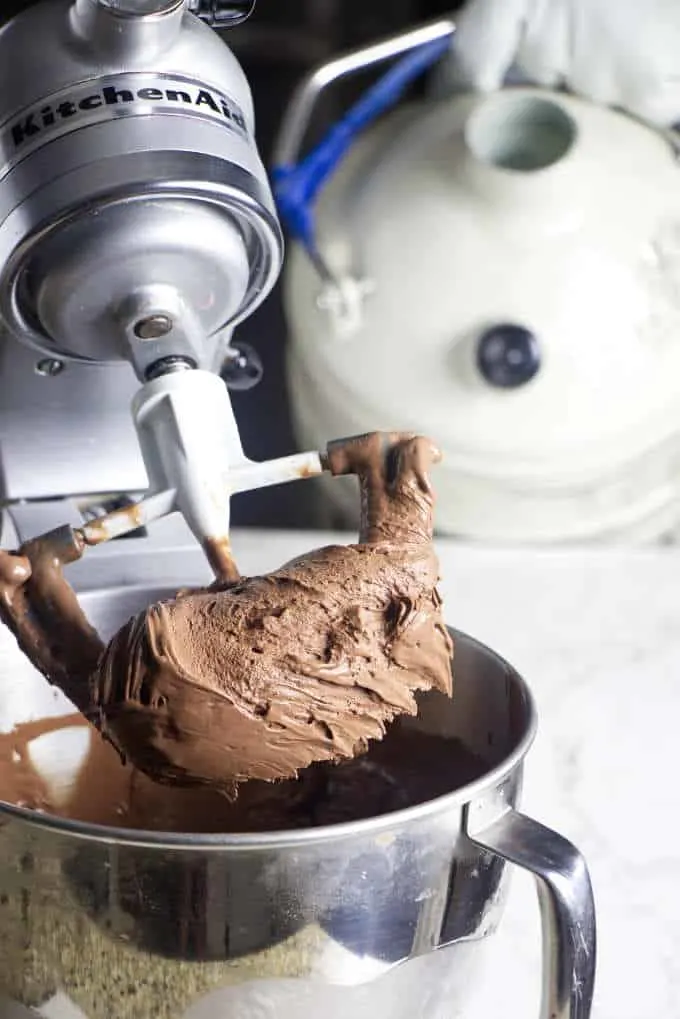 a mixer with chocolate ice cream and liquid nitrogen in the background