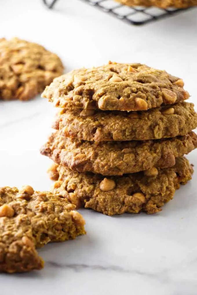 Stack of chewy cookies with butterscotch chips in them.