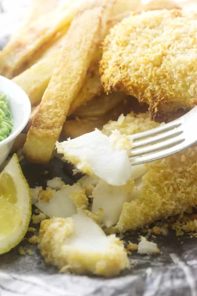 Close-up of flaky fish and crisp chips