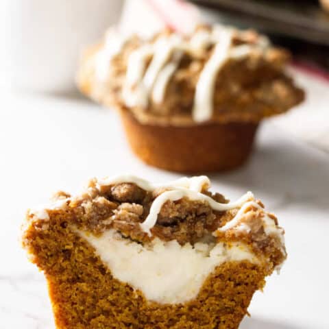 Cheesecake Stuffed Pumpkin Muffins