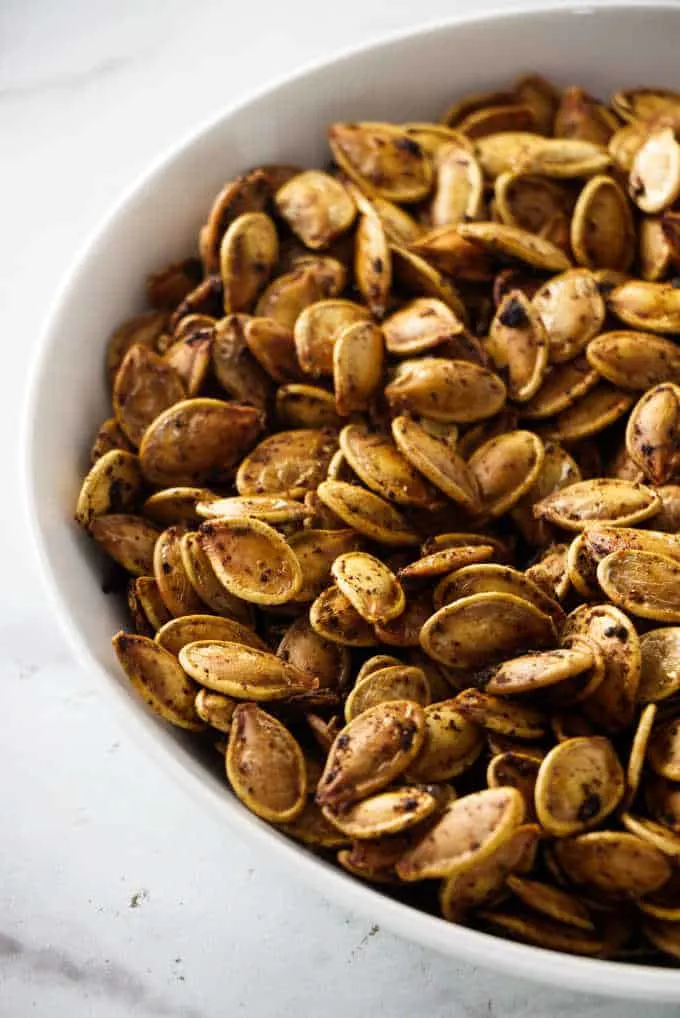 roasted pumpkin seeds in a serving bowl