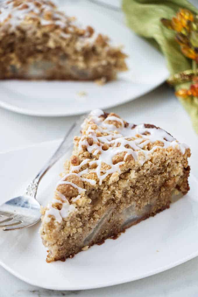 Close up photo of a slice of fresh pear cake.