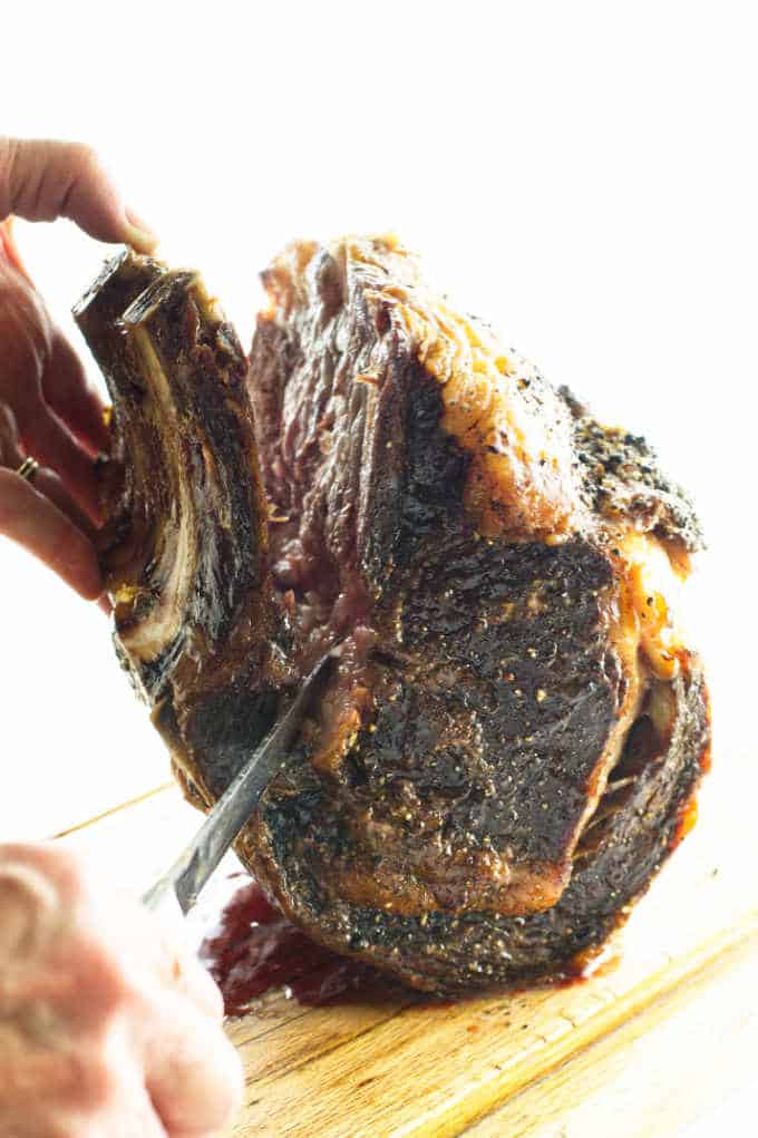 Rib roast with ribs being cut off