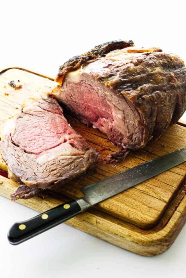 rib roast on cutting board with knife