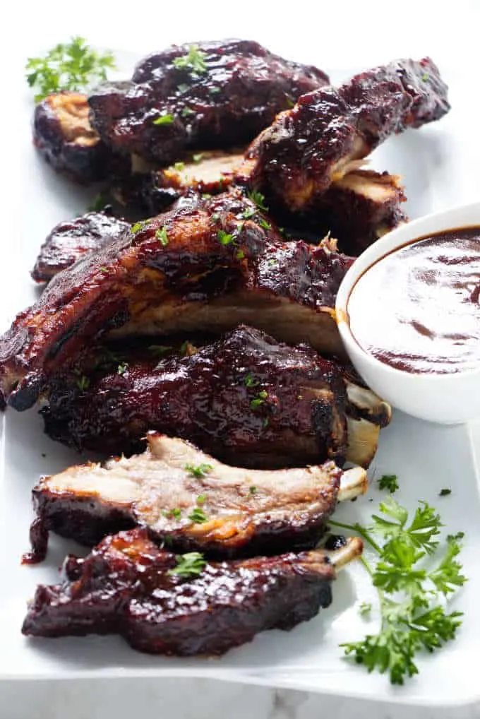 A serving plate of baby back ribs made in the Instant Pot