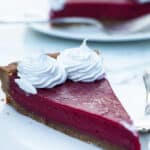 a slice of a cranberry curd tart