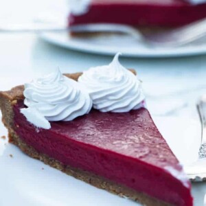 a slice of a cranberry curd tart